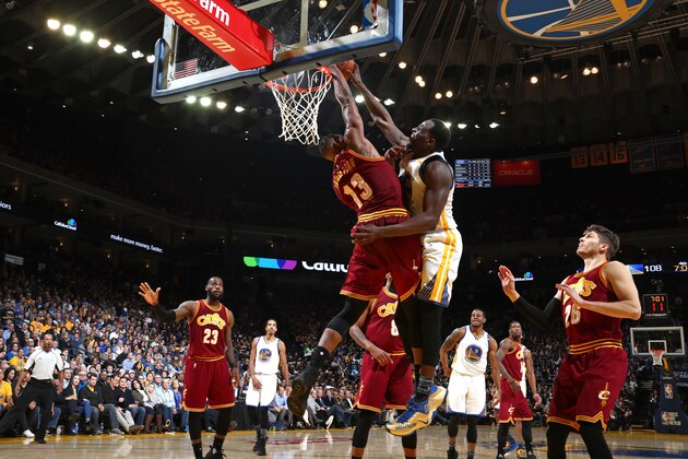 OAKLAND, CA - JANUARY 16: Draymond Green #23 of the Golden State Warriors dunks against Tristan Thompson #13 of the Cleveland Cavaliers on January 16, 2017 at ORACLE Arena in Oakland, California. NOTE TO USER: User expressly acknowledges and agrees that, by downloading and or using this photograph, user is consenting to the terms and conditions of Getty Images License Agreement. Mandatory Copyright Notice: Copyright 2017 NBAE (Photo by Nathaniel S. Butler/NBAE via Getty Images)