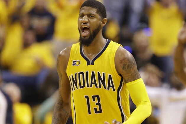 Indiana Pacers' Paul George reacts during the first half in Game 3 of a first-round NBA basketball playoff series against the Cleveland Cavaliers,Thursday, April 20, 2017, in Indianapolis. (AP Photo/Michael Conroy)