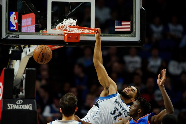 MINNEAPOLIS, MN - APRIL 11: Karl-Anthony Towns #32 of the Minnesota Timberwolves shoots the ball against Jerami Grant #9 of the Oklahoma City Thunder during the second quarter of the game on April 11, 2017 at the Target Center in Minneapolis, Minnesota. NOTE TO USER: User expressly acknowledges and agrees that, by downloading and or using this Photograph, user is consenting to the terms and conditions of the Getty Images License Agreement. (Photo by Hannah Foslien/Getty Images)