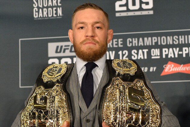 NEW YORK, NY - NOVEMBER 12:  UFC featherweight and lightweight champion Conor McGregor of Ireland poses for a picture during the UFC 205 post fight press conference at Madison Square Garden on November 12, 2016 in New York City. (Photo by Brandon Magnus/Zuffa LLC/Zuffa LLC via Getty Images)