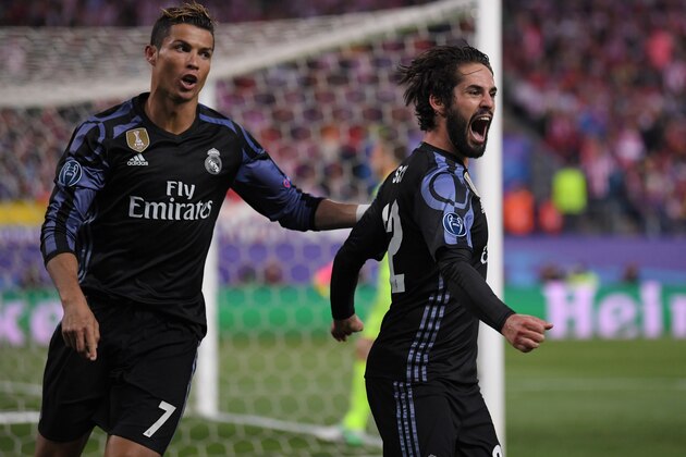 MADRID, SPAIN - MAY 10:  Isco (R) of Real Madrid celebrates scoring his team's opening goal with Cristiano Ronaldo during the UEFA Champions League Semi Final second leg match between Club Atletico de Madrid and Real Madrid CF at Vicente Calderon Stadium on May 10, 2017 in Madrid, Spain.  (Photo by Laurence Griffiths/Getty Images)