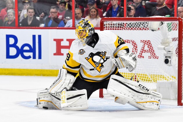 OTTAWA, ON - MAY 17:  Marc-Andre Fleury #29 of the Pittsburgh Penguins makes a pad save against the Ottawa Senators in Game Three of the Eastern Conference Final during the 2017 NHL Stanley Cup Playoffs at Canadian Tire Centre on May 17, 2017 in Ottawa, Ontario, Canada.  The Ottawa Senators defeated the Pittsburgh Penguins 5-1.  (Photo by Minas Panagiotakis/Getty Images)