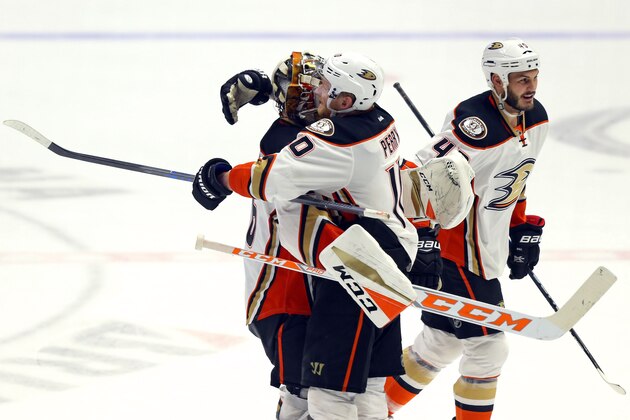 May 18, 2017; Nashville, TN, USA; Anaheim Ducks goalie John Gibson (left) celebrates with teammate right wing Corey Perry (10) after defeating the Nashville Predators in the overtime period in game four of the Western Conference Final of the 2017 Stanley Cup Playoffs at Bridgestone Arena. Mandatory Credit: Aaron Doster-USA TODAY Sports