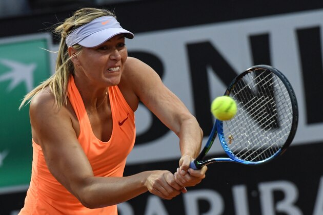 Russia's Maria Sharapova returns the ball to Mirjana Lucic-Baroni of Croatia during their tennis match at the ATP Tennis Open tournament on May 16, 2017 at the Foro Italico in Rome.    / AFP PHOTO / ANDREAS SOLARO        (Photo credit should read ANDREAS SOLARO/AFP/Getty Images)