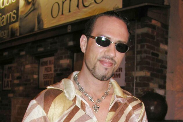 WEST HOLLYWOOD:  Former World Wrestling Federation Champion X-Pac signs autographs in front of the Rainbow Bar & Grill, September 01, 2003 in West Hollywood, California.  (Photo by Alexander Sibaja/Getty Images)