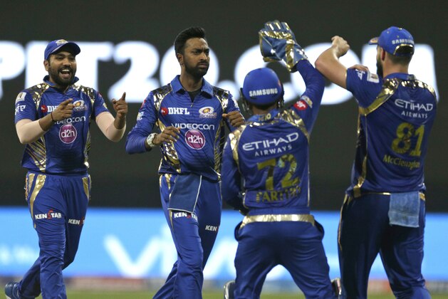 Mumbai Indians players celebrate the wicket of Kolkata Knight Riders batsman Gautam Gambhir during their Indian Premier League (IPL) cricket match in Mumbai, India, Sunday, April 9, 2017. (AP Photo/Rafiq Maqbool)