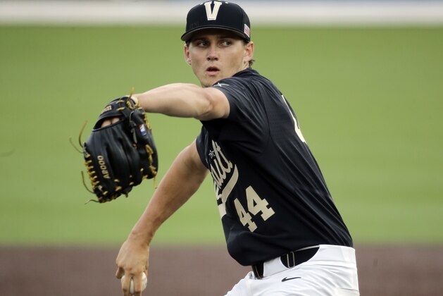 Vanderbilt starter Kyle Wright pitches against Washington in the first inning of an NCAA college baseball regional tournament game Saturday, June 4, 2016, in Nashville, Tenn. (AP Photo/Mark Humphrey)