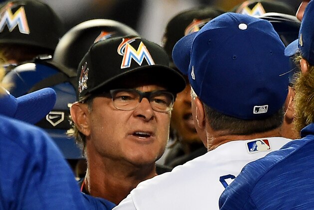 LOS ANGELES, CA - MAY 19:  Don Mattingly #8, manager of the Miami Marlins and Bob Geren #8, bench coach of the Los Angeles Dodgers exchange words after benches cleared in the eighth inning at Dodger Stadium on May 19, 2017 in Los Angeles, California. Both, along with pitcher Ross Stripling #68 of the Los Angeles Dodgers, were ejected from the game.  (Photo by Jayne Kamin-Oncea/Getty Images)