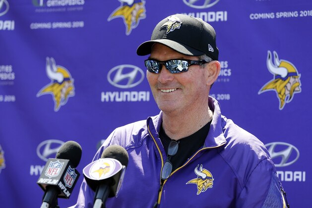 Minnesota Vikings head coach Mike Zimmer smiles in response to a question during the NFL football team rookies minicamp Friday, May 5, 2017, in Eden Prairie, Minn. (AP Photo/Jim Mone)