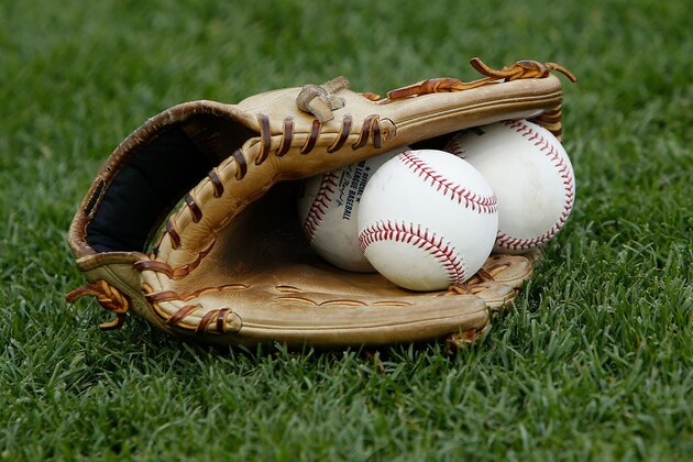 SAN FRANCISCO, CA - MAY 16: A glove and baseballs sit on the field during batting practice before the game against the Los Angeles Dodgers and the San Francisco Giants at AT&T Park on May 16, 2017 in San Francisco, California. (Photo by Lachlan Cunningham/Getty Images)