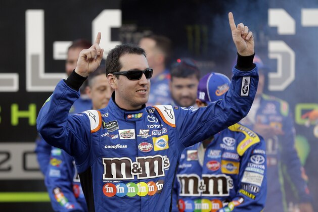 Kyle Busch is introduced before the NASCAR Cup series All-Star auto race at Charlotte Motor Speedway in Concord, N.C., Saturday, May 20, 2017. (AP Photo/Chuck Burton)
