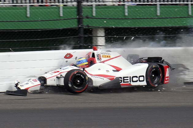 The car driven by Sebastien Bourdais, of France, impacts the wall in the second turn during qualifications for the Indianapolis 500 IndyCar auto race at Indianapolis Motor Speedway, Saturday, May 20, 2017 in Indianapolis. (AP Photo/Jamie Gallagher)