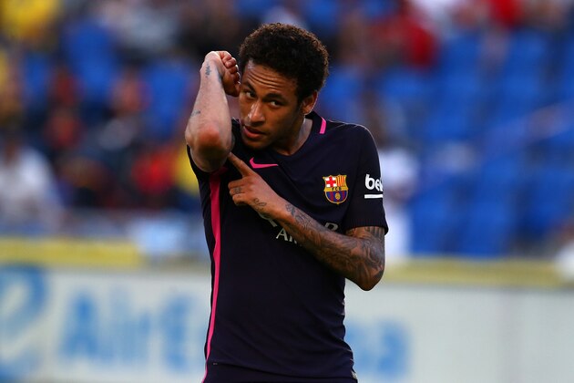 LAS PALMAS, SPAIN - MAY 14: Neymar of Barcelona celebrates by pointing to a tattoo on his arm after scoring his third goal and the teams fourth of the game during the La Liga match between UD Las Palmas and Barcelona at Estadio de Gran Canaria on May 14, 2017 in Las Palmas, Spain. (Photo by Charlie Crowhurst/Getty Images)