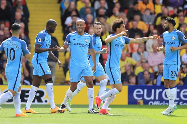 WATFORD, ENGLAND - MAY 21: Vincent Kompany of Manchester City celebrates scoring his sides first goal with his Manchester City team mates during the Premier League match between Watford and Manchester City at Vicarage Road on May 21, 2017 in Watford, England.  (Photo by Richard Heathcote/Getty Images)