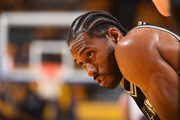 OAKLAND, CA - MAY 14: Kawhi Leonard #2 of the San Antonio Spurs looks on during the game against the Golden State Warriors in Game One of the Western Conference Finals of the 2017 NBA Playoffs on May 14, 2017 at ORACLE Arena in Oakland, California. NOTE TO USER: User expressly acknowledges and agrees that, by downloading and/or using this Photograph, user is consenting to the terms and conditions of the Getty Images License Agreement. Mandatory Copyright Notice: Copyright 2017 NBAE (Photo by Andrew D. Bernstein/NBAE via Getty Images)