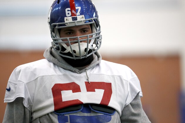 New York Giants offensive guard Justin Pugh works out during NFL football practice, Thursday, Dec. 15, 2016, in East Rutherford, N.J. (AP Photo/Julio Cortez)