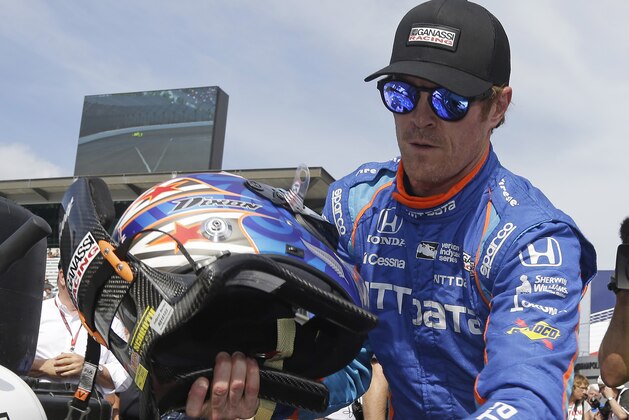 Scott Dixon, of New Zealand, puts his helmet away during qualifications for the Indianapolis 500 IndyCar auto race at Indianapolis Motor Speedway, Saturday, May 20, 2017 in Indianapolis. (AP Photo/Michael Conroy) Scott Dixon, of New Zealand, puts his helmet away during qualifications for the Indianapolis 500 IndyCar auto race at Indianapolis Motor Speedway, Saturday, May 20, 2017 in Indianapolis. (AP Photo/Michael Conroy)
