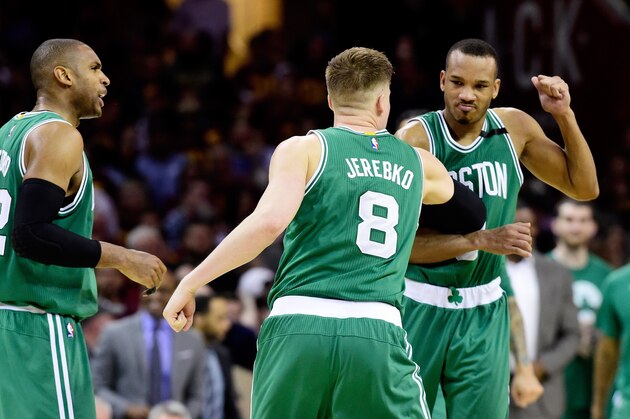 CLEVELAND, OH - MAY 21:  Avery Bradley #0 celebrates with Jonas Jerebko #8 of the Boston Celtics after their 111 to 108 win over the Cleveland Cavaliers during Game Three of the 2017 NBA Eastern Conference Finals at Quicken Loans Arena on May 21, 2017 in Cleveland, Ohio. NOTE TO USER: User expressly acknowledges and agrees that, by downloading and or using this photograph, User is consenting to the terms and conditions of the Getty Images License Agreement.  (Photo by Jason Miller/Getty Images)