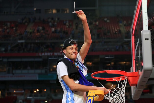 GLENDALE, AZ - APRIL 03: Justin Jackson #44 of the North Carolina Tar Heels cuts the net after defeating the Gonzaga Bulldogs during the 2017 NCAA Men's Final Four National Championship game at University of Phoenix Stadium on April 3, 2017 in Glendale, Arizona. The Tar Heels defeated the Bulldogs 71-65. (Photo by Ronald Martinez/Getty Images)