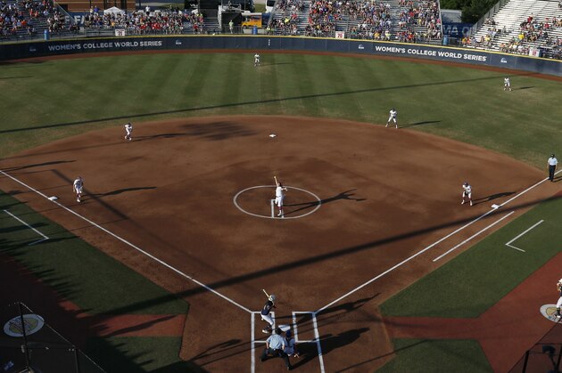 Florida's Lauren Haeger pitches in the first inning of the final game against Michigan in the NCAA softball Women's College World Series, Wednesday, June 3, 2015, in Oklahoma City. (AP Photo/Sue Ogrocki)
