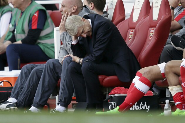 Arsenal manager Arsene Wenger looks dejected during the English Premier League soccer match between Arsenal and Everton at The Emirates stadium in London, Sunday May 21, 2017. (AP Photo/Tim Ireland)