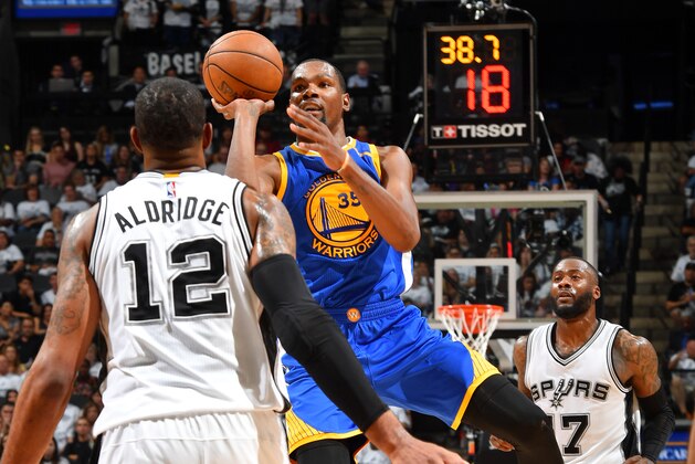 SAN ANTONIO, TX - MAY 20: Kevin Durant #35 of the Golden State Warriors shoots the ball during the game against the San Antonio Spurs during Game Three of the Western Conference Finals of the 2017 NBA Playoffs on May 20, 2017 at the AT&T Center in San Antonio, Texas. NOTE TO USER: User expressly acknowledges and agrees that, by downloading and or using this photograph, user is consenting to the terms and conditions of the Getty Images License Agreement. Mandatory Copyright Notice: Copyright 2017 NBAE (Photos by Jesse D. Garrabrant/NBAE via Getty Images)