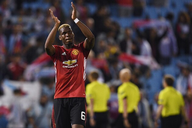 VIGO, SPAIN - MAY 04:  Paul Pogba of Manchester United celebrates victory after the UEFA Europa League semi final, first leg match between Celta Vigo and Manchester United at the Estadio Balaidos on May 4, 2017 in Vigo, Spain.  (Photo by David Ramos/Getty Images)