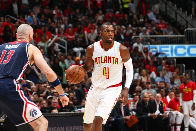 ATLANTA, GA - APRIL 24:  Paul Millsap #4 of the Atlanta Hawks handles the ball against the Washington Wizards during Game Four of the Eastern Conference Quarterfinals of the 2017 NBA Playoffs on April 24, 2017 at Philips Arena in Atlanta, Georgia. NOTE TO USER: User expressly acknowledges and agrees that, by downloading and/or using this photograph, user is consenting to the terms and conditions of the Getty Images License Agreement. Mandatory Copyright Notice: Copyright 2017 NBAE (Photo by Kevin Liles/NBAE via Getty Images)