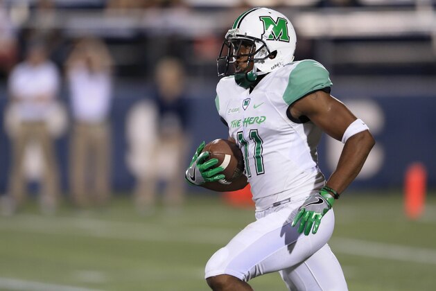 MIAMI, FL - NOVEMBER 19: Rodney Allen #11 of the Marshall Thundering Herd returns an intercepted pass during the first quarter of the game against the FIU Panthers on November 19, 2016 in Miami, Florida. (Photo by Rob Foldy/Getty Images)