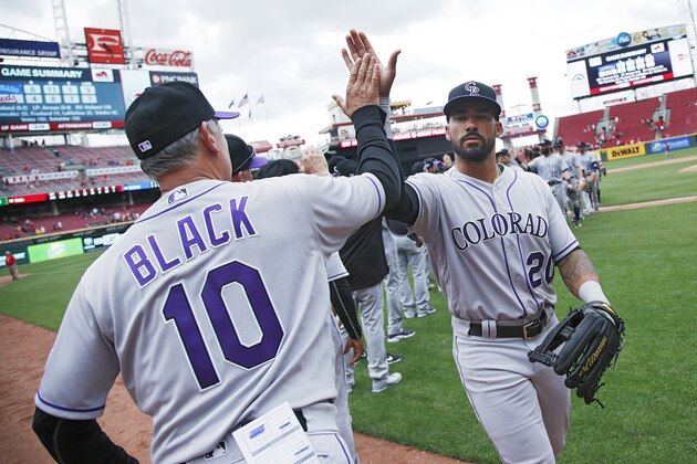 CINCINNATI, OH - MAY 21: Colorado Rockies manager Bud Black celebrates with Ian Desmond #20 after the final out in the ninth inning of a game against the Cincinnati Reds at Great American Ball Park on May 21, 2017 in Cincinnati, Ohio. The Rockies defeated the Reds 6-4. (Photo by Joe Robbins/Getty Images)
