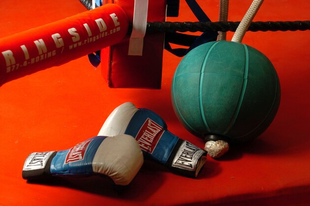 NEW ZEALAND - FEBRUARY 08:  Stock Photography. Generic Boxing Image. Everlast boxing gloves and a medicine ball photographed outside a boxing ring.  (Photo by Ross Land/Getty Images)