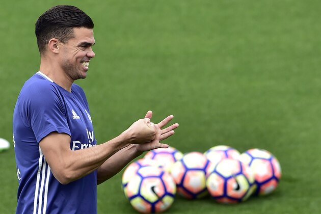 Real Madrid's Portuguese defender Pepe smiles during a training session at Valdebebas training ground in Madrid on May 5, 2017, on the eve of the Spanish League match football match Granada CF vs Real Madrid CF. / AFP PHOTO / GERARD JULIEN (Photo credit should read GERARD JULIEN/AFP/Getty Images) Real Madrid's Portuguese defender Pepe smiles during a training session at Valdebebas training ground in Madrid on May 5, 2017, on the eve of the Spanish League match football match Granada CF vs Real Madrid CF. / AFP PHOTO / GERARD JULIEN (Photo credit should read GERARD JULIEN/AFP/Getty Images)