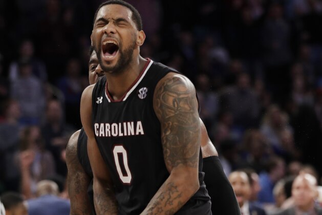 South Carolina guard Sindarius Thornwell (0) reacts after dunking the ball against Florida during the second half of the East Regional championship game of the NCAA men's college basketball tournament, Sunday, March 26, 2017, in New York. South Carolina won 77-70. (AP Photo/Julio Cortez)