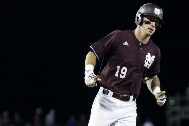 Mississippi State's Brent Rooker rounds third base during his three run home run trot against Mississippi in the fifth inning of the Governor's Cup in an NCAA college baseball game at Trustmark Park Stadium in Pearl, Miss., Tuesday, April 25, 2017. (AP Photo/Rogelio V. Solis)