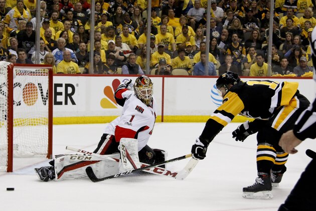 Ottawa Senators goalie Mike Condon makes a save on Pittsburgh Penguins' Bryan Rust (17) during the second period of Game 5 in the NHL hockey Stanley Cup Eastern Conference finals, Sunday, May 21, 2017, in Pittsburgh. (AP Photo/Gene J.Puskar) Ottawa Senators goalie Mike Condon makes a save on Pittsburgh Penguins' Bryan Rust (17) during the second period of Game 5 in the NHL hockey Stanley Cup Eastern Conference finals, Sunday, May 21, 2017, in Pittsburgh. (AP Photo/Gene J.Puskar)