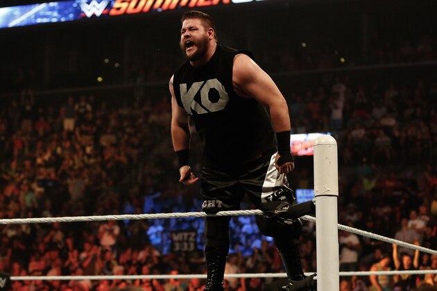 NEW YORK, NY - AUGUST 23:  Kevin Owens celebrates his victory over Cesaro at the WWE SummerSlam 2015 at Barclays Center of Brooklyn on August 23, 2015 in New York City.  (Photo by JP Yim/Getty Images)