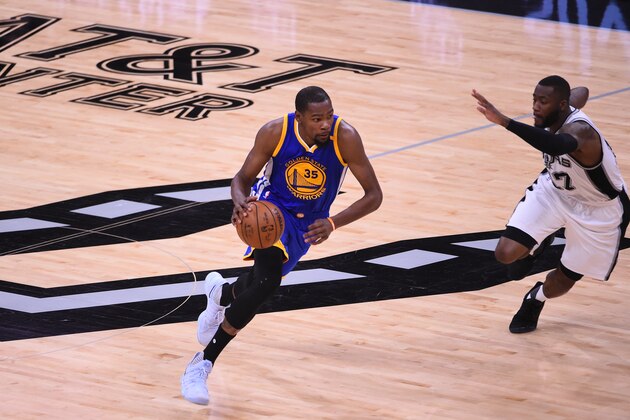 SAN ANTONIO, TX - MAY 20: Kevin Durant #35 of the Golden State Warriors handles the ball against the San Antonio Spurs during Game Four of the Western Conference Finals of the 2017 NBA Playoffs on May 20, 2017 AT&T Center in San Antonio, Texas. NOTE TO USER: User expressly acknowledges and agrees that, by downloading and or using this photograph, user is consenting to the terms and conditions of the Getty Images License Agreement. Mandatory Copyright Notice: Copyright 2017 NBAE (Photos by Noah Graham /NBAE via Getty Images)