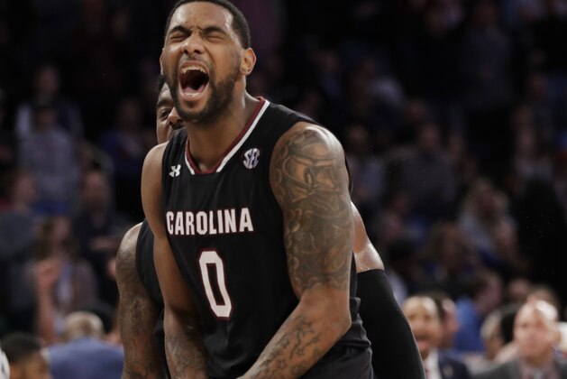 South Carolina guard Sindarius Thornwell (0) reacts after dunking the ball against Florida during the second half of the East Regional championship game of the NCAA men's college basketball tournament, Sunday, March 26, 2017, in New York. South Carolina won 77-70. (AP Photo/Julio Cortez)