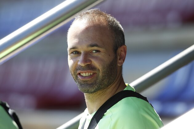 FC Barcelona's Andres Iniesta smiles during a training session at the Sports Center FC Barcelona Joan Gamper in Sant Joan Despi, Spain, Saturday, May 20, 2017. FC Barcelona will play against Eibar during a Spanish La Liga on Sunday. (AP Photo/Manu Fernandez)