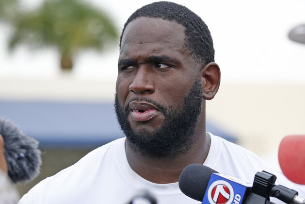 DAVIE, FL - AUGUST 8: Branden Albert #76 of the Miami Dolphins talks to the media after the teams training camp on August 8, 2016 at the Miami Dolphins training facility in Davie, Florida. (Photo by Joel Auerbach/Getty Images)