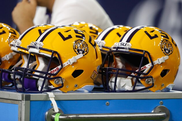 LSU helmets sit on the bench area during the Texas Bowl NCAA football game Tuesday, Dec. 29, 2015, in Houston. LSU won 56-27. (AP Photo/Bob Levey)