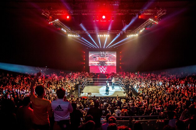Roman and Seth celebrate in the ring during the WWE show at Zenith Arena on may 09, 2017 in Lille, France. / AFP PHOTO / PHILIPPE HUGUEN        (Photo credit should read PHILIPPE HUGUEN/AFP/Getty Images)