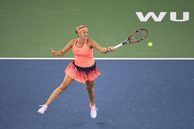 Petra Kvitova of the Czech Republic hits a return to Dominika Cibulkova of Slovakia during the final of the WTA Wuhan Open tennis tournament in Wuhan, in China's central Hubei province on October 1, 2016.
Two-time Wimbledon champion Petra Kvitova ended her 13-month title drought with a straight set win over Dominika Cibulkova at the Wuhan Open on October 1. / AFP / GREG BAKER        (Photo credit should read GREG BAKER/AFP/Getty Images)