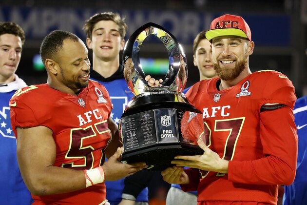 ORLANDO, FL - JANUARY 29:  Lorenzo Alexander #57 and Travis Kelce #87 pose with the tophy after the AFC defeated the NFC 20 to 13 during the NFL Pro Bowl at the Orlando Citrus Bowl on January 29, 2017 in Orlando, Florida.  (Photo by Sam Greenwood/Getty Images)