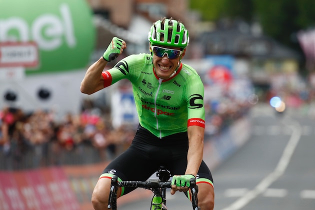 France's Pierre Rolland of team Cannondale-Drapac celebrates as he crosses the finish line to win the 17th stage of the 100th Giro d'Italia, Tour of Italy, cycling race from Tirano to Canazei on May 24, 2017.  / AFP PHOTO / Luk BENIES        (Photo credit should read LUK BENIES/AFP/Getty Images)