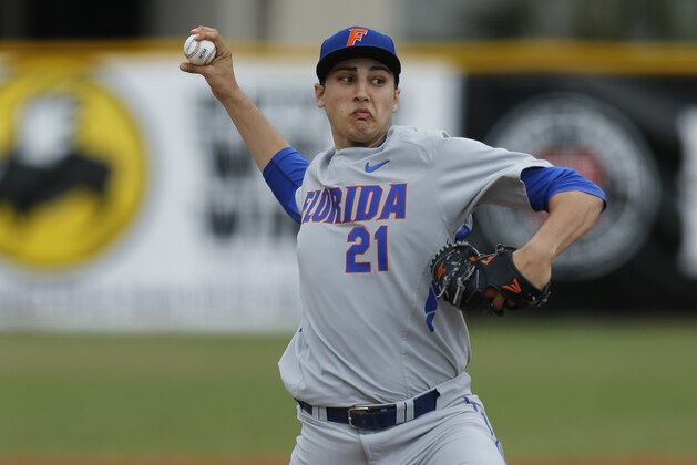 CORAL GABLES, FL - FEBRUARY 28: Alex Faedo #21 of the Florida Gators throws the ball against the Miami Hurricanes on February 28, 2016 at Alex Rodriguez Park at Mark Light Field in Coral Gables, Florida. Florida defeated Miami 7-3. (Photo by Joel Auerbach/Getty Images)