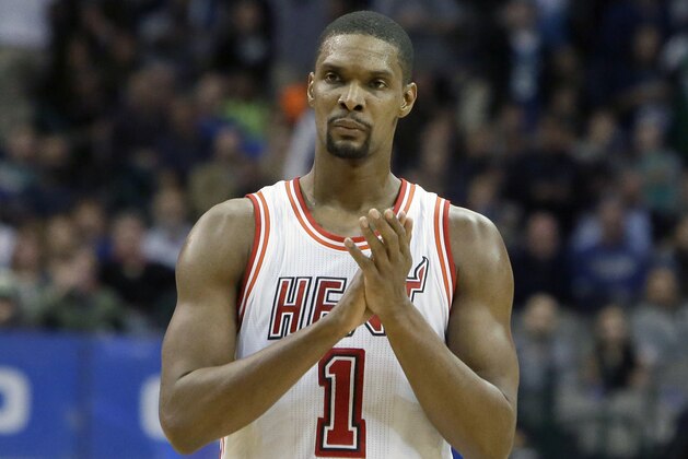 FILE - In this Feb. 3, 2016, file photo, Miami Heat forward Chris Bosh (1) reacts to a call during the second half of an NBA basketball game against the Dallas Mavericks, in Dallas. Bosh was dealing with more than one blood clot earlier this year, and said Wednesday, Sept. 21, 2016,  that he felt written off when Miami Heat team doctors advised him that the situation would likely be career-ending. (AP Photo/LM Otero, File)