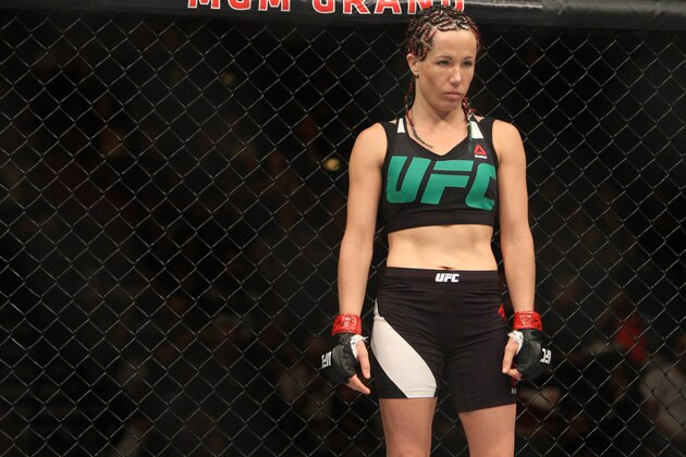 LAS VEGAS, NV - JULY 12:  Angela Magana enters the Octagon for her fight against Michelle Waterson in their women's strawweight bout during the Ultimate Fighter Finale inside MGM Grand Garden Arena on July 12, 2015 in Las Vegas, Nevada.  (Photo by Mitch Viquez/Zuffa LLC/Zuffa LLC via Getty Images)