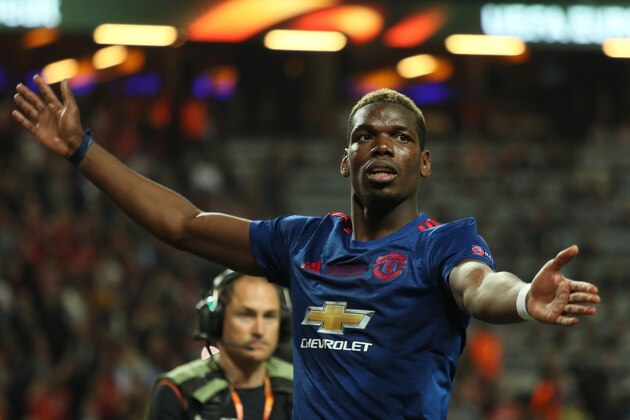STOCKHOLM, SWEDEN - MAY 24:  Paul Pogba of Manchester United celebrates at the end of the UEFA Europa League Final between Ajax and Manchester United at Friends Arena on May 24, 2017 in Stockholm, Sweden.  (Photo by Matthew Ashton - AMA/Getty Images)