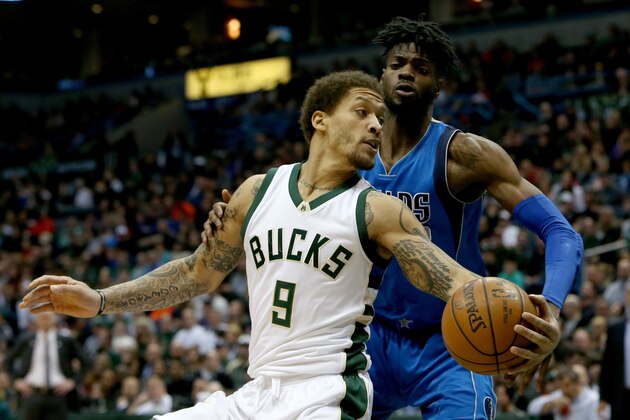 MILWAUKEE, WI - APRIL 02:  Michael Beasley #9 of the Milwaukee Bucks dribbles the ball while being guarded by Nerlens Noel #3 of the Dallas Mavericks in the first quarter at BMO Harris Bradley Center on April 2, 2017 in Milwaukee, Wisconsin. NOTE TO USER: User expressly acknowledges and agrees that , by downloading and or using this photograph, User is consenting to the terms and conditions of the Getty Images License Agreement. (Photo by Dylan Buell/Getty Images)
